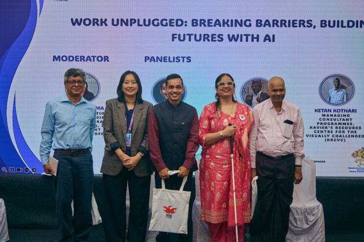 Group photo of speakers and moderator with Nidhi at the end of the panel. 