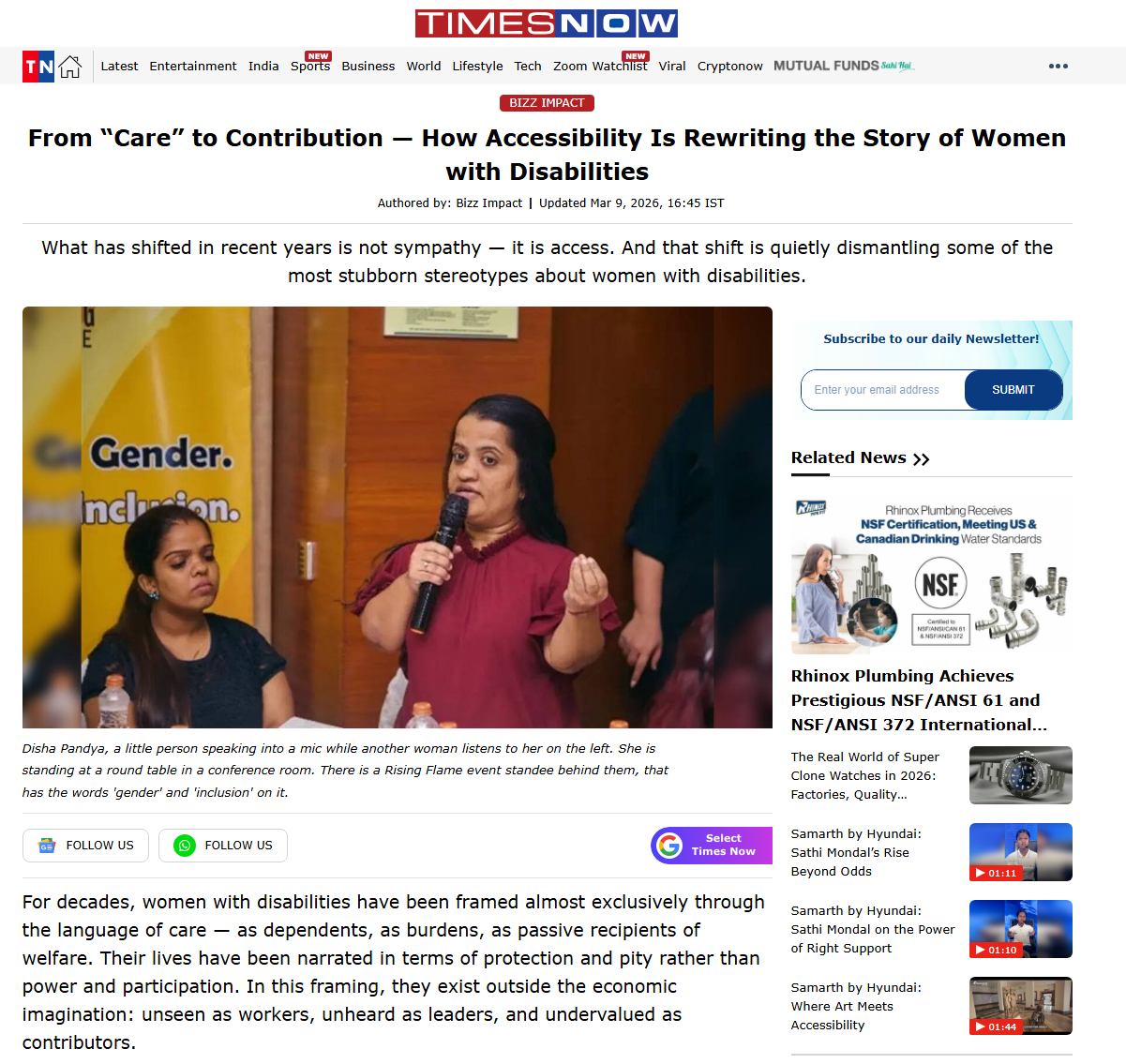 Screenshot of the Times Now website with an article on it. Headline reads: From “Care” to Contribution — How Accessibility Is Rewriting the Story of Women with Disabilities. Subheader: What has shifted in recent years is not sympathy — it is access. And that shift is quietly dismantling some of the most stubborn stereotypes about women with disabilities. The feature image is of Disha Pandya, a little person speaking into a mic in a conference room. There is a Rising Flame banner behind her and someone next to her listening. The beginning of the article is also shown. Reads: For decades, women with disabilities have been framed almost exclusively through the language of care — as dependents, as burdens, as passive recipients of welfare. Their lives have been narrated in terms of protection and pity rather than power and participation. In this framing, they exist outside the economic imagination: unseen as workers, unheard as leaders, and undervalued as contributors.